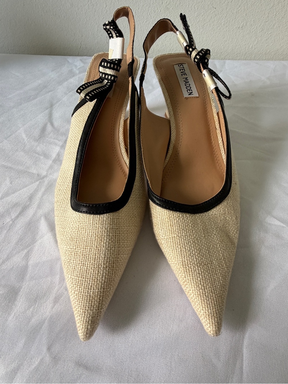 Steve Madden Cream Pointed Slingback Flats with Black Trim and Bow Accent